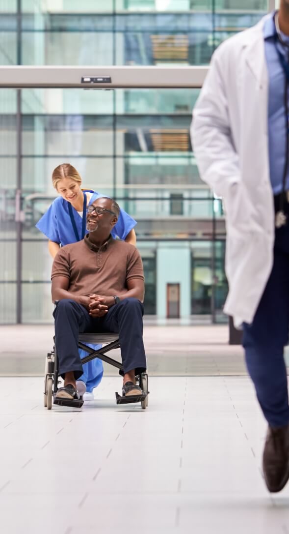 Nurse and patient in wheelchair